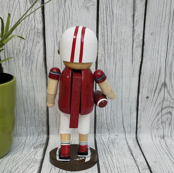 Wooden 9" Nutcracker w/ Helmet & Holding Football - Picture 3 of 9